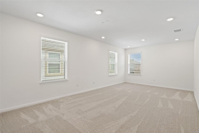 708 Leeward Pass, Leander, TX 78641 - spare room with light carpet and recessed lighting