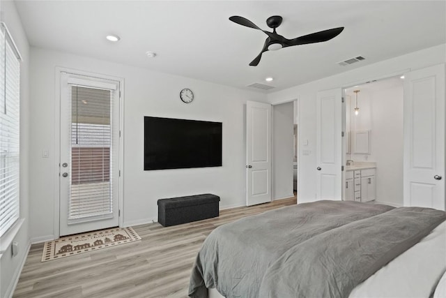 708 Leeward Pass, Leander, TX 78641 - bedroom featuring access to outside, light wood finished floors, connected bathroom, recessed lighting, and a ceiling fan