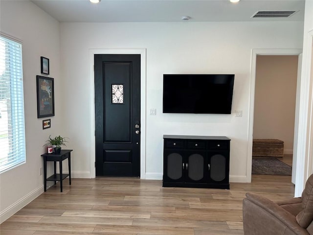 22046 Gateway Arch Dr, Porter, TX 77365 - living area with light wood-style flooring, recessed lighting, and baseboards
