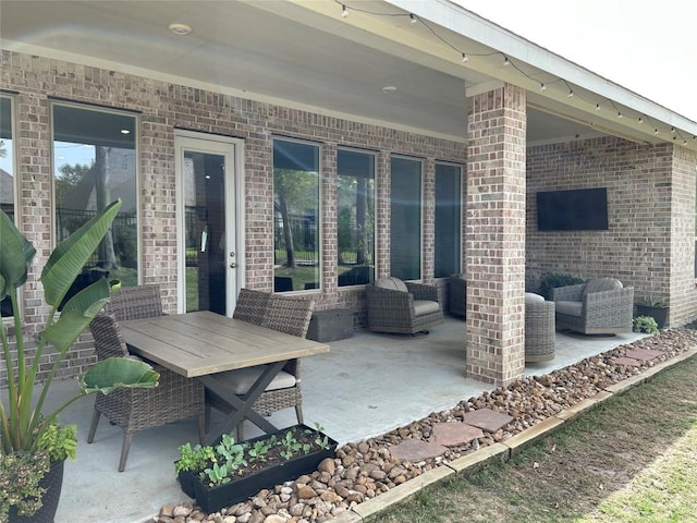 22046 Gateway Arch Dr, Porter, TX 77365 - view of patio with an outdoor living space