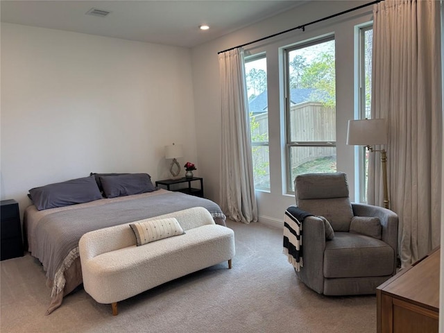 22046 Gateway Arch Dr, Porter, TX 77365 - bedroom featuring light carpet, baseboards, and recessed lighting