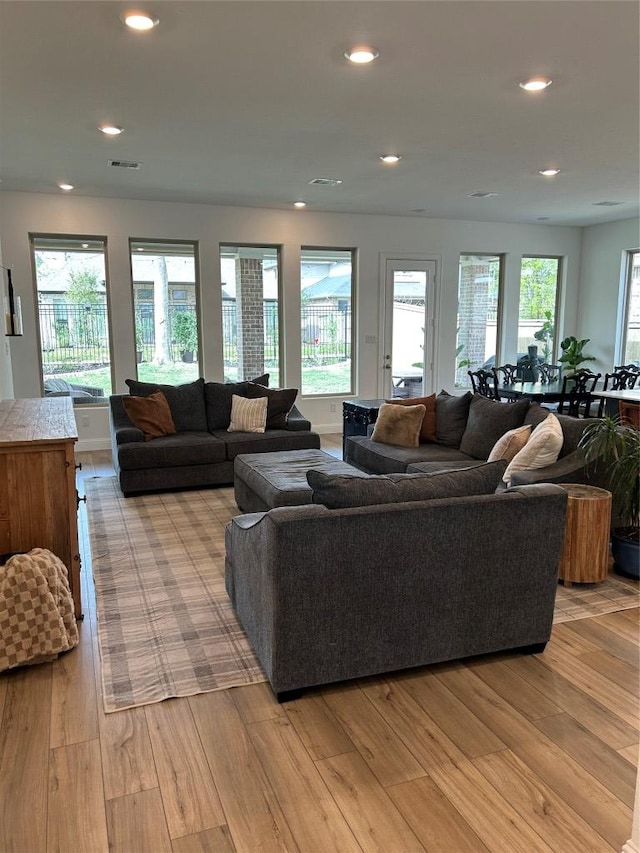 22046 Gateway Arch Dr, Porter, TX 77365 - living room with light wood-style flooring and recessed lighting