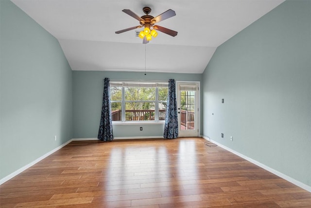 318 Ridge Run Dr, Georgetown, TX 78628 - spare room with vaulted ceiling, a ceiling fan, wood finished floors, and baseboards