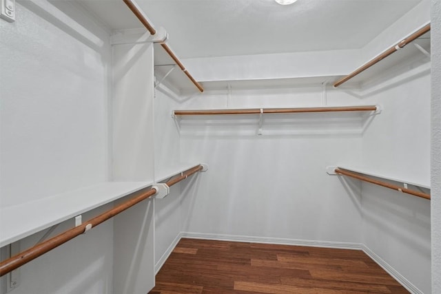 318 Ridge Run Dr, Georgetown, TX 78628 - spacious closet featuring dark wood finished floors