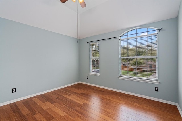 318 Ridge Run Dr, Georgetown, TX 78628 - unfurnished room with healthy amount of natural light, wood finished floors, a ceiling fan, lofted ceiling, and baseboards