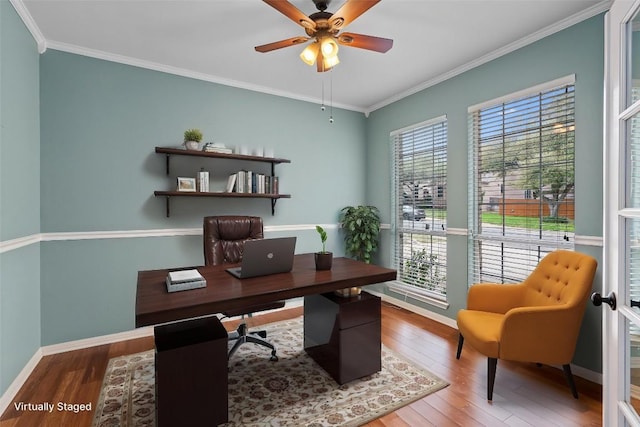 318 Ridge Run Dr, Georgetown, TX 78628 - office area with wood finished floors, ornamental molding, baseboards, and a ceiling fan