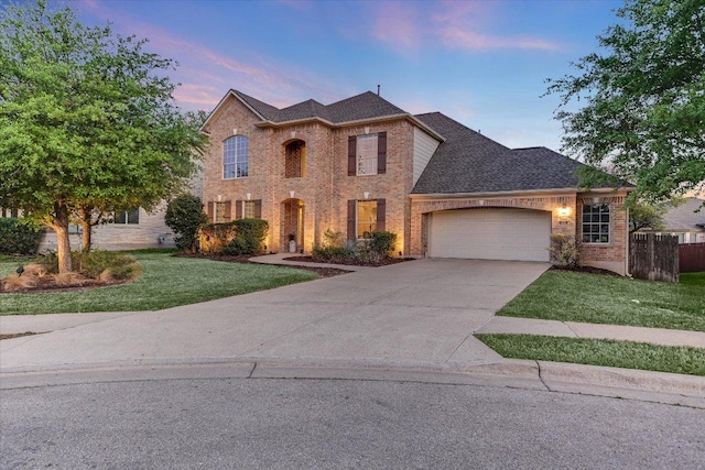 431 Ridgetop Bnd, Cedar Park, TX 78613 - traditional-style home with brick siding, a garage, driveway, and roof with shingles