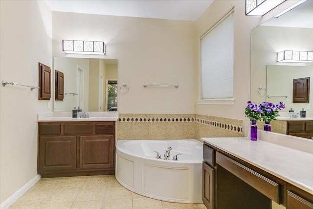 431 Ridgetop Bnd, Cedar Park, TX 78613 - full bath with a garden tub, two vanities, and tile patterned flooring