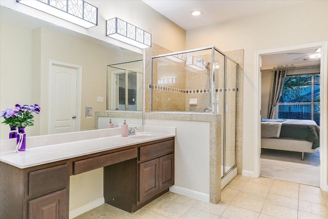 431 Ridgetop Bnd, Cedar Park, TX 78613 - ensuite bathroom featuring a stall shower, vanity, tile patterned floors, recessed lighting, and baseboards
