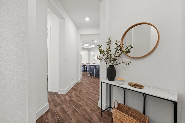 206 Olivia Dr Unit 120, Austin, TX 78738 - hall with baseboards, dark wood-style flooring, and recessed lighting