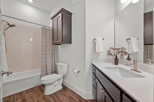 206 Olivia Dr Unit 120, Austin, TX 78738 - full bath featuring vanity, toilet, shower / tub combo, wood tiled floors, and baseboards