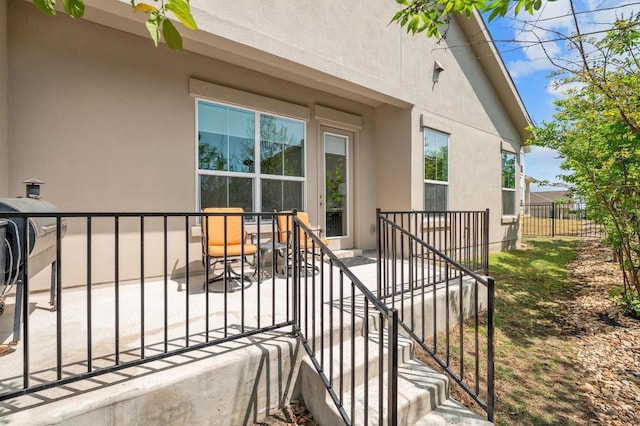206 Olivia Dr Unit 120, Austin, TX 78738 - entrance to property with stucco siding and a patio