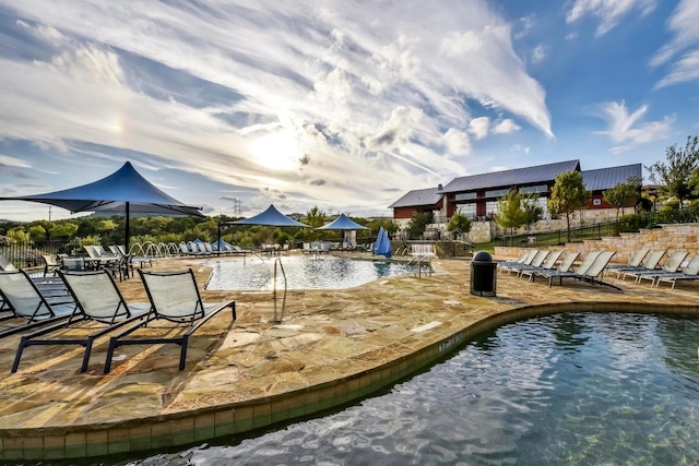 206 Olivia Dr Unit 120, Austin, TX 78738 - dock featuring a patio area and a community pool