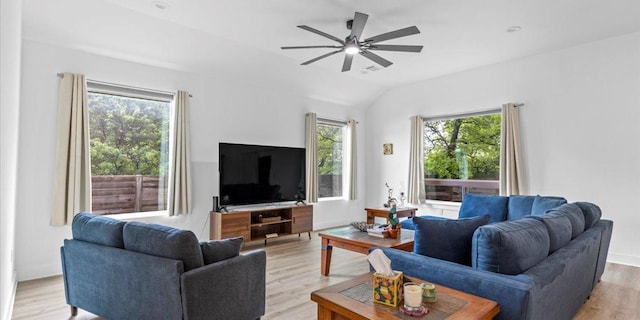 4711 Little Hill Cir, Austin, TX 78725 - living area with a ceiling fan, light wood-style floors, and vaulted ceiling