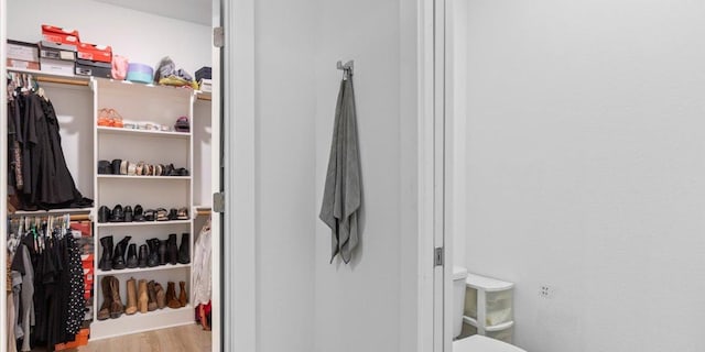 4711 Little Hill Cir, Austin, TX 78725 - spacious closet featuring wood finished floors