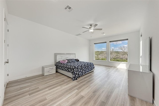 2420 Novara Trl, Leander, TX 78641 - bedroom with light wood-type flooring and a ceiling fan