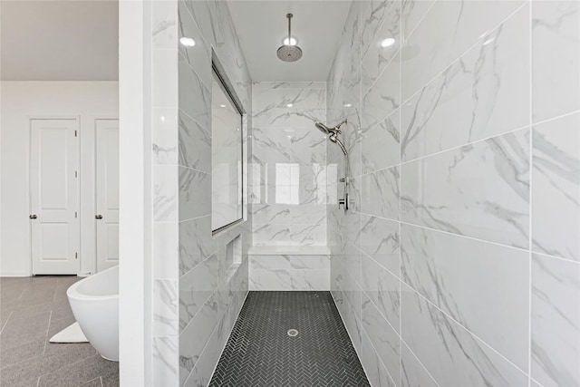 2420 Novara Trl, Leander, TX 78641 - bathroom featuring a marble finish shower and a freestanding tub