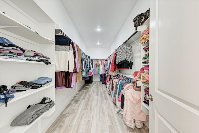 2420 Novara Trl, Leander, TX 78641 - walk in closet with wood finished floors