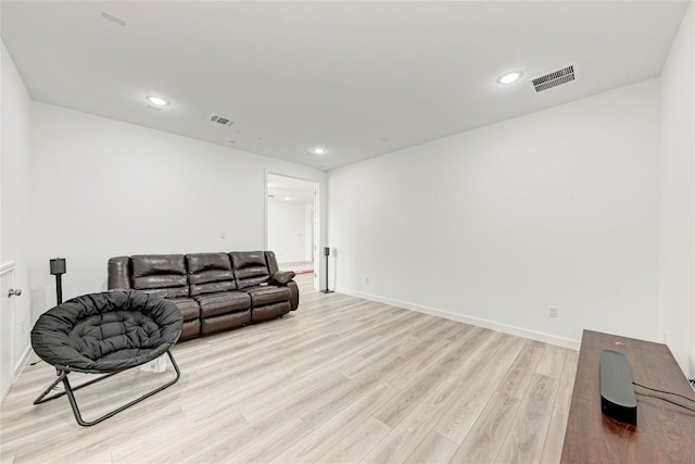 2420 Novara Trl, Leander, TX 78641 - sitting room with light wood-type flooring and recessed lighting