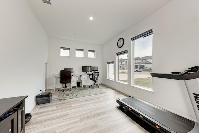 2420 Novara Trl, Leander, TX 78641 - home office with plenty of natural light, light wood-type flooring, a baseboard heating unit, and recessed lighting
