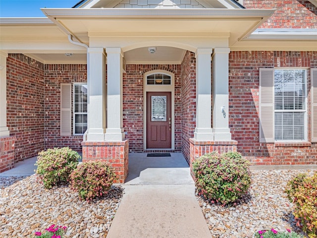 2009 Tillman Dr, Cedar Park, TX 78613 - doorway to property with brick siding and covered porch