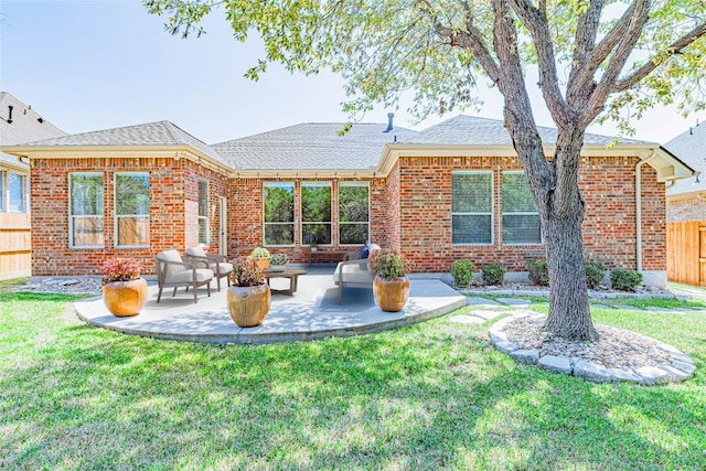 2009 Tillman Dr, Cedar Park, TX 78613 - back of house with brick siding, a patio area, and a shingled roof
