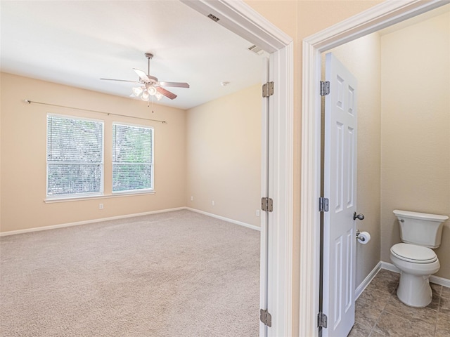 2009 Tillman Dr, Cedar Park, TX 78613 - bathroom featuring a ceiling fan and toilet