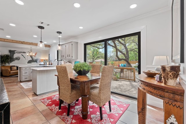 2906 Quail Run Dr, Round Rock, TX 78681 - dining area with crown molding, recessed lighting, and light tile patterned floors
