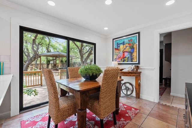 2906 Quail Run Dr, Round Rock, TX 78681 - dining space featuring ornamental molding, light tile patterned floors, and recessed lighting