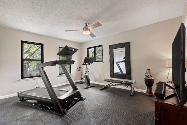2906 Quail Run Dr, Round Rock, TX 78681 - workout room featuring ceiling fan, healthy amount of natural light, and a textured ceiling