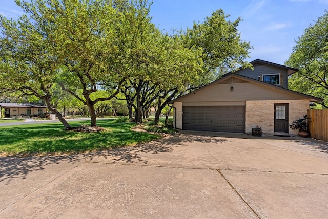 2906 Quail Run Dr, Round Rock, TX 78681 - view of front of house featuring concrete driveway, brick siding, and an attached garage
