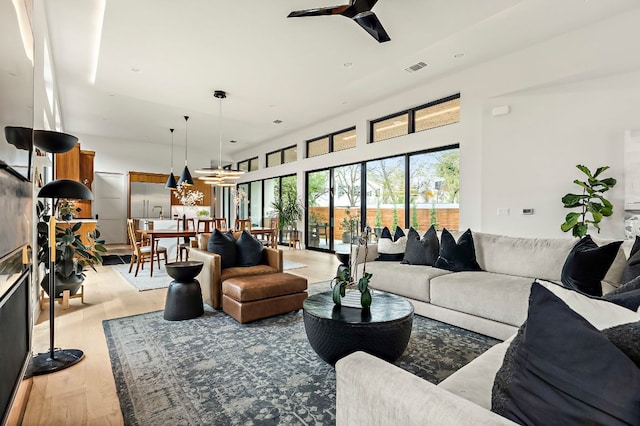 2116 Kenwood Ave, Austin, TX 78704 - living area featuring light wood-style flooring and a ceiling fan