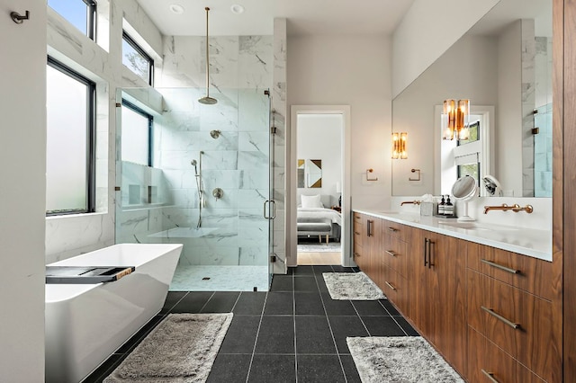 2116 Kenwood Ave, Austin, TX 78704 - bathroom with a marble finish shower, a freestanding bath, tile patterned floors, and vanity