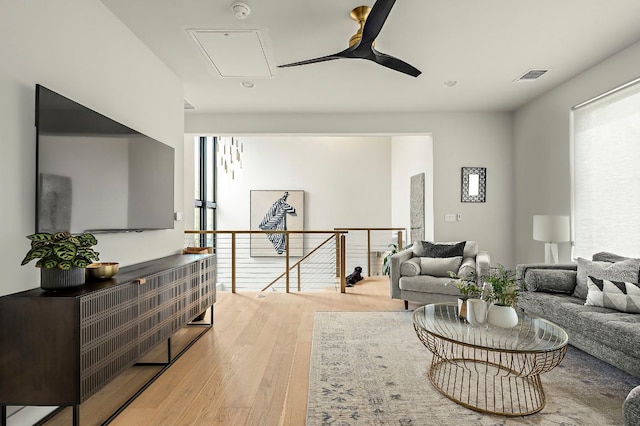 2116 Kenwood Ave, Austin, TX 78704 - living room featuring light wood finished floors, attic access, and a ceiling fan