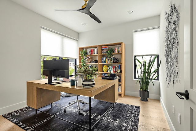 2116 Kenwood Ave, Austin, TX 78704 - office area with a ceiling fan, baseboards, and wood finished floors