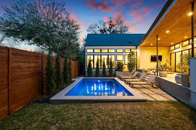 2116 Kenwood Ave, Austin, TX 78704 - back of property with metal roof and a patio