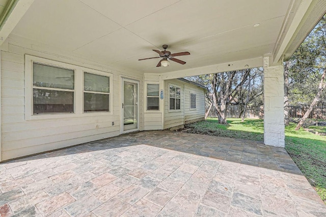 view of patio featuring ceiling fan