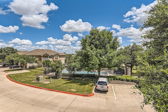 9201 Brodie Ln Unit 201, Austin, TX 78748 - view of front facade with uncovered parking