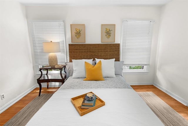 2108 Rountree Dr, Austin, TX 78722 - bedroom with wood finished floors and baseboards