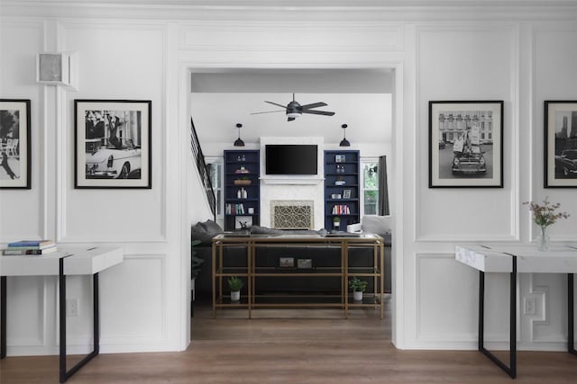 6307 Cannonleague Dr, Austin, TX 78745 - detailed view of a decorative wall, wood finished floors, and ceiling fan