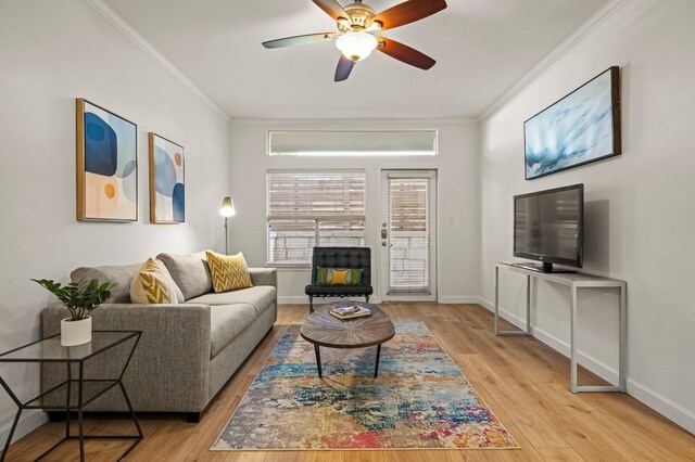 2209 Hancock Dr Unit 3, Austin, TX 78756 - living room with crown molding, wood finished floors, and a ceiling fan