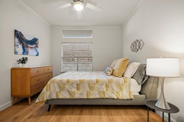 2209 Hancock Dr Unit 3, Austin, TX 78756 - bedroom featuring ornamental molding, light wood finished floors, and ceiling fan