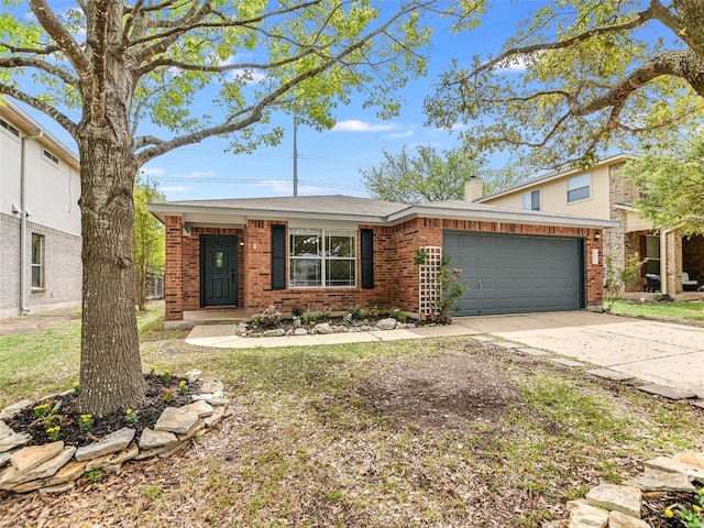 402 Washington Square Dr, Leander, TX 78641 - view of front of house featuring brick siding, a garage, driveway, and a chimney