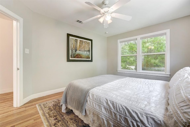 3902 Willbert Rd, Austin, TX 78751 - bedroom with baseboards, light wood-style flooring, and ceiling fan