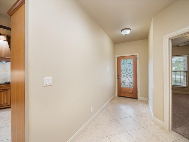 1008 Laurel Oak Cir, Marble Falls, TX 78654 - doorway featuring light tile patterned floors and baseboards