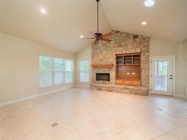 1008 Laurel Oak Cir, Marble Falls, TX 78654 - unfurnished living room with ceiling fan, a stone fireplace, baseboards, high vaulted ceiling, and recessed lighting