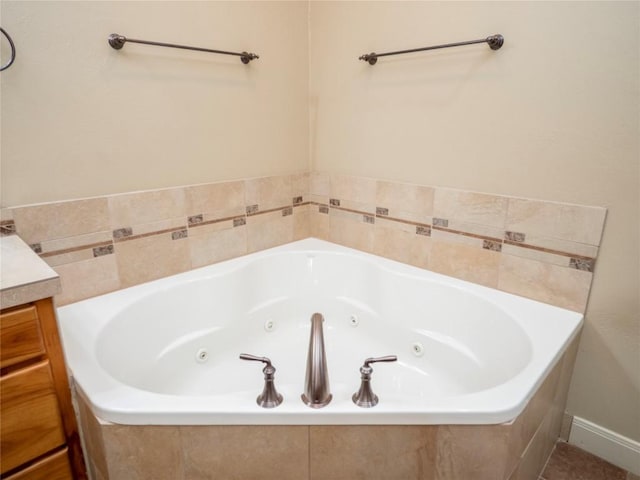 1008 Laurel Oak Cir, Marble Falls, TX 78654 - bathroom featuring a jetted tub and vanity