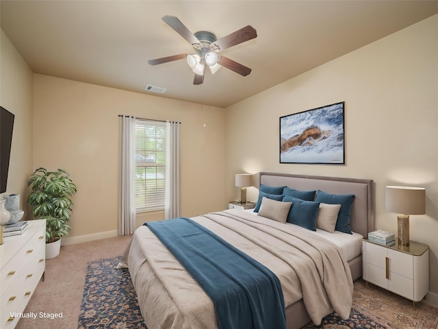 1008 Laurel Oak Cir, Marble Falls, TX 78654 - carpeted bedroom with baseboards and a ceiling fan