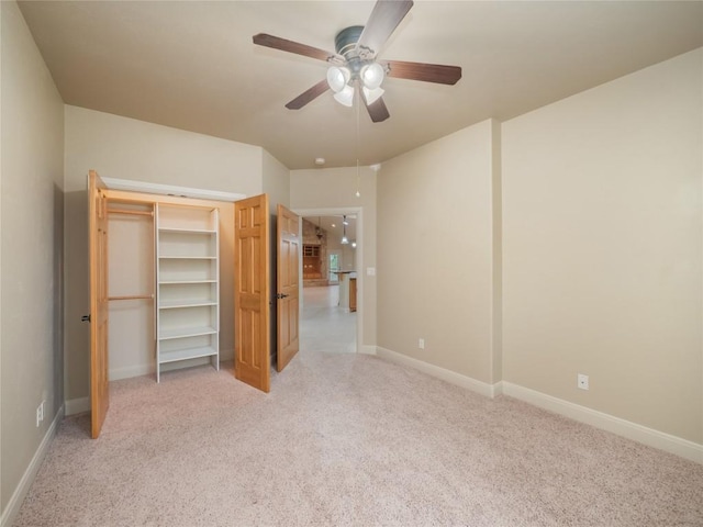 1008 Laurel Oak Cir, Marble Falls, TX 78654 - unfurnished bedroom with light colored carpet, baseboards, ceiling fan, and a closet