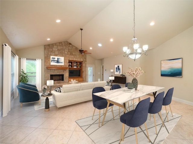 1008 Laurel Oak Cir, Marble Falls, TX 78654 - dining area featuring lofted ceiling, light tile patterned flooring, recessed lighting, a stone fireplace, and ceiling fan